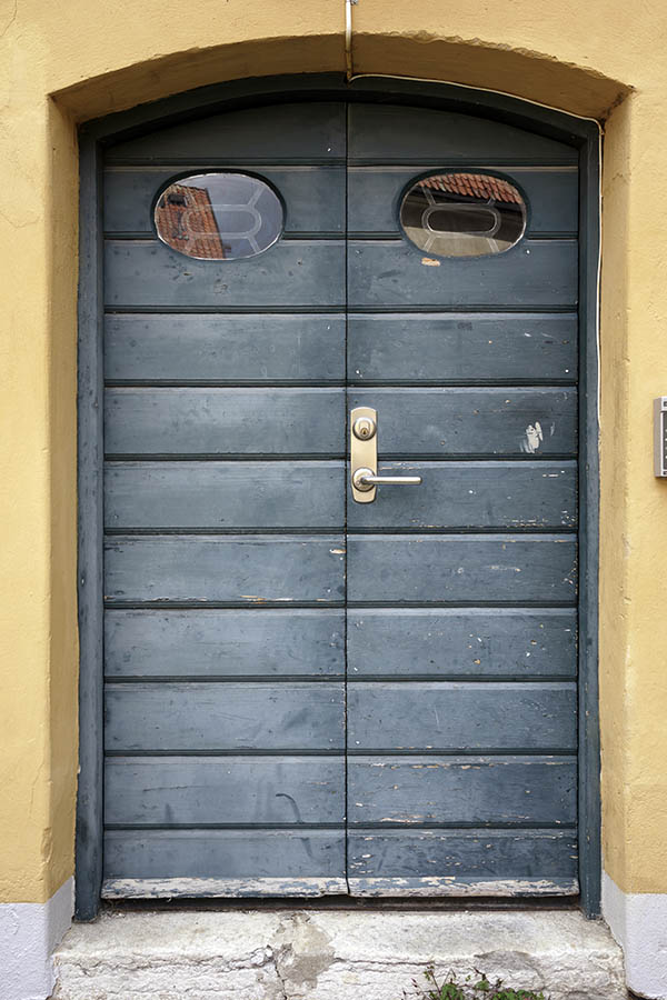 Photo 27275: Formed, teal double door of boards with oval door lights