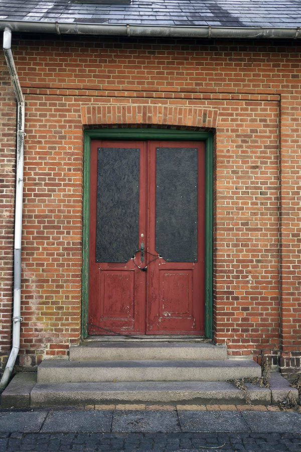 Photo 27391: Worn, red, panelled double doors