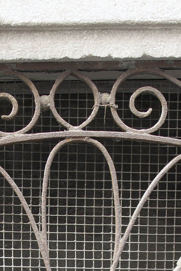 Photo 02380: Rusty, brown window with lattice