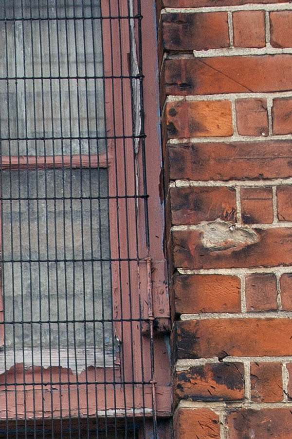 Photo 05111: Large, pale red sash window with lattice