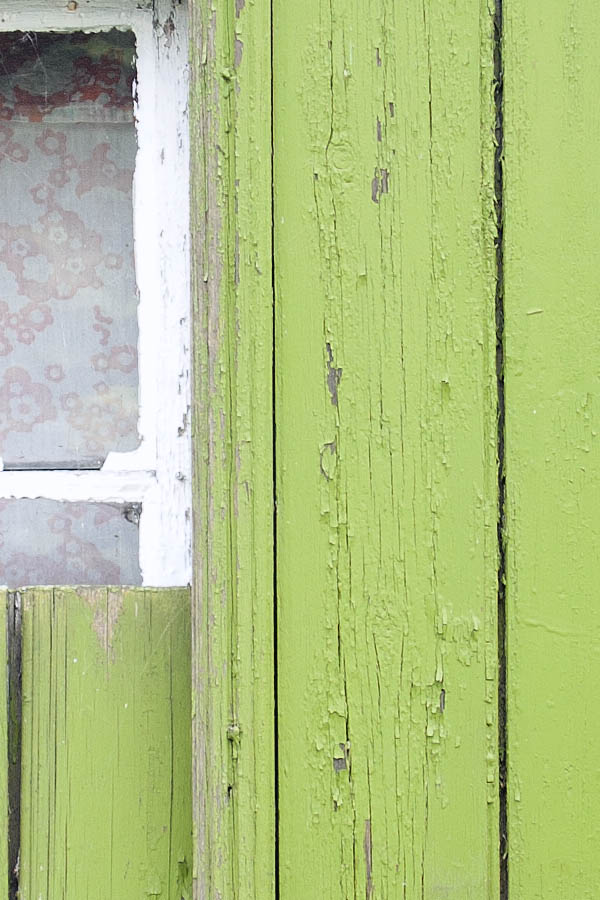 Photo 06181: Light green shutters covering a white window