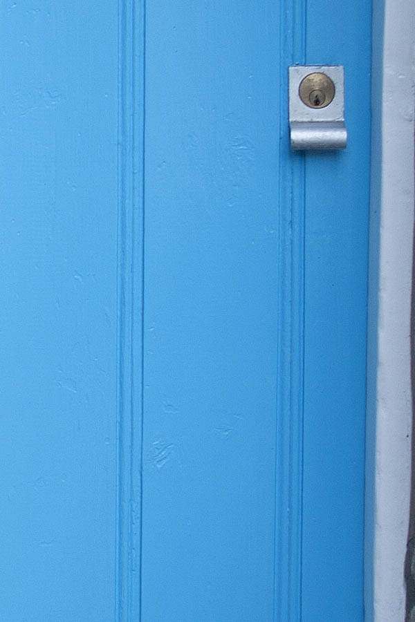 Photo 06576: Formed, light blue door with white casing