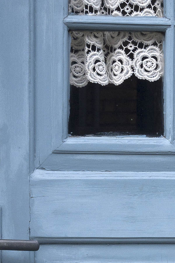 Photo 08467: Panelled, light blue door with door light