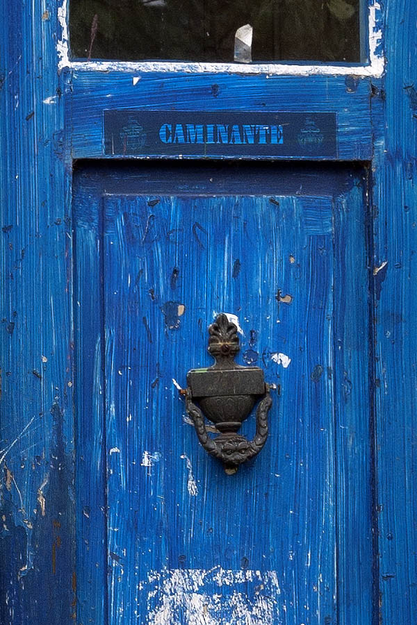 Photo 09078: Worn, panelled, blue double door with door lights