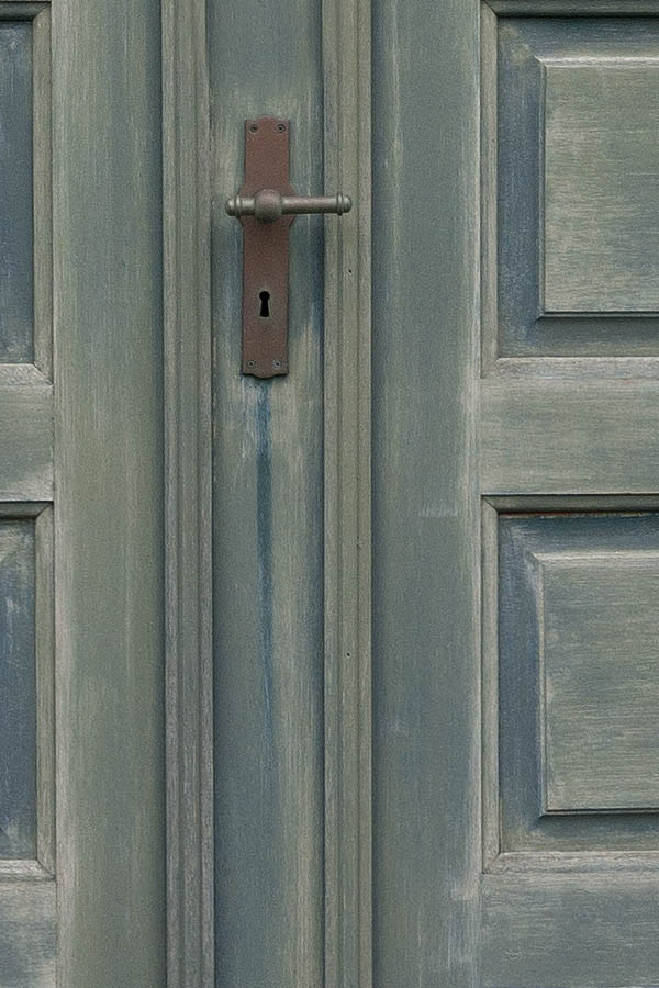 Photo 09689: Worn, panelled, teal double door with fan light