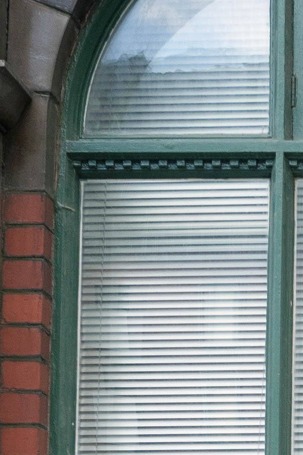 Photo 11557: Formed, green window with six panes