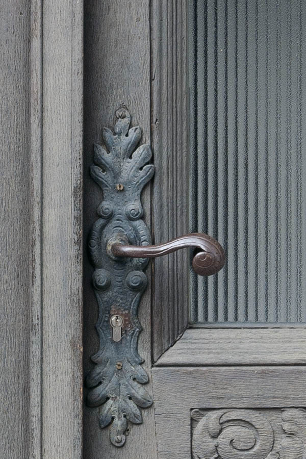 Photo 11859: Worn, carved, panelled, unpainted double door with door lights