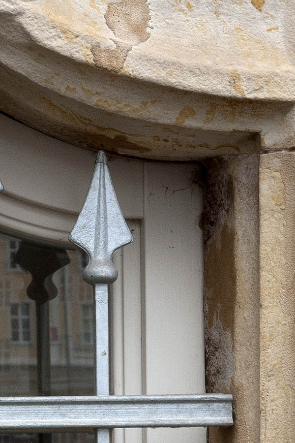 Photo 12170: Little, formed, white window with grating