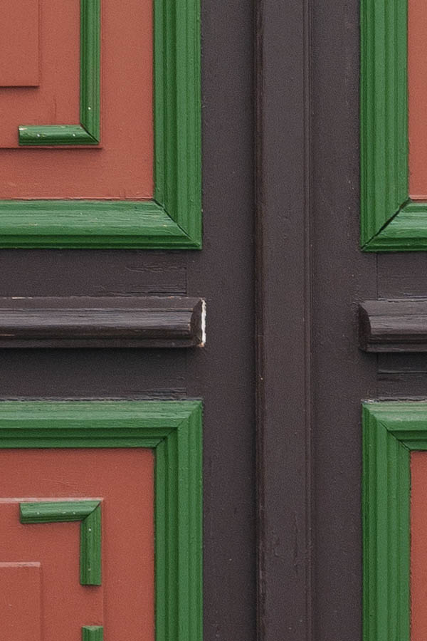 Photo 12597: Wide, panelled, brown, green and orange door with top window