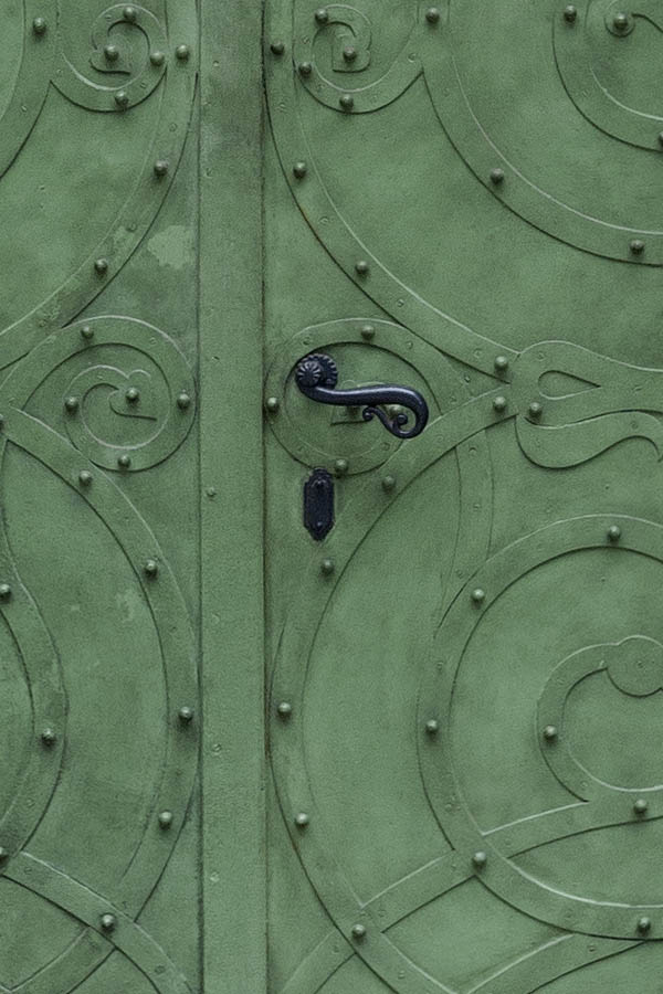 Photo 13720: Formed, light green metal double door with metal decoration