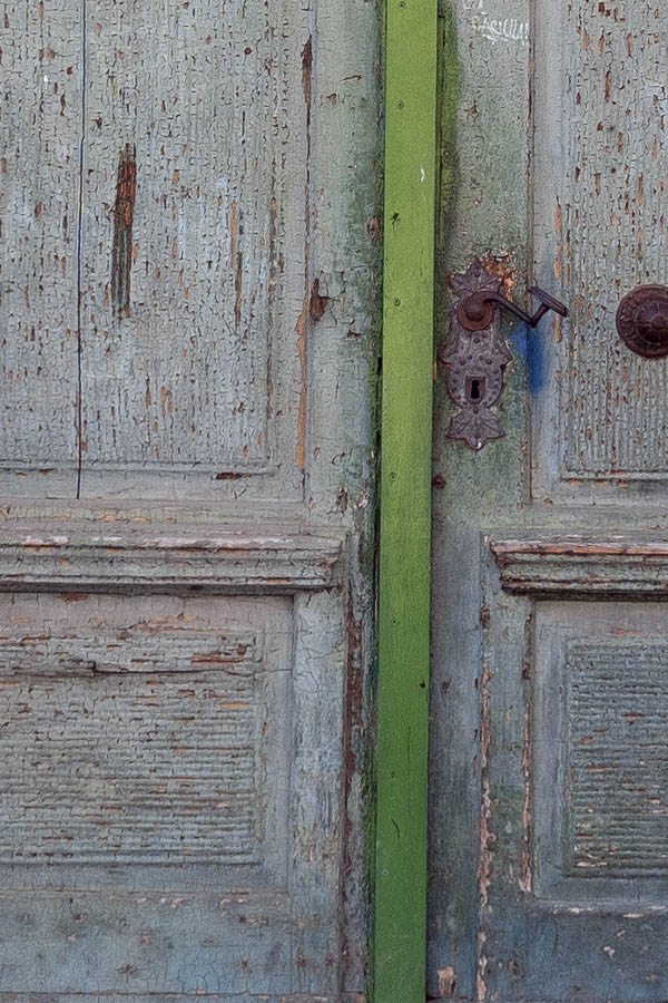 Photo 14488: Formed, carved, panelled grey and green gate with two minor doors