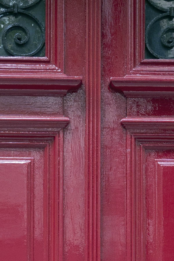 Photo 15577: Formed, panelled, cerise red double door with latticed door lights