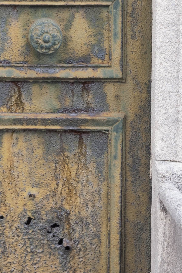 Photo 15584: Decayed, yellow and green cast iron double door