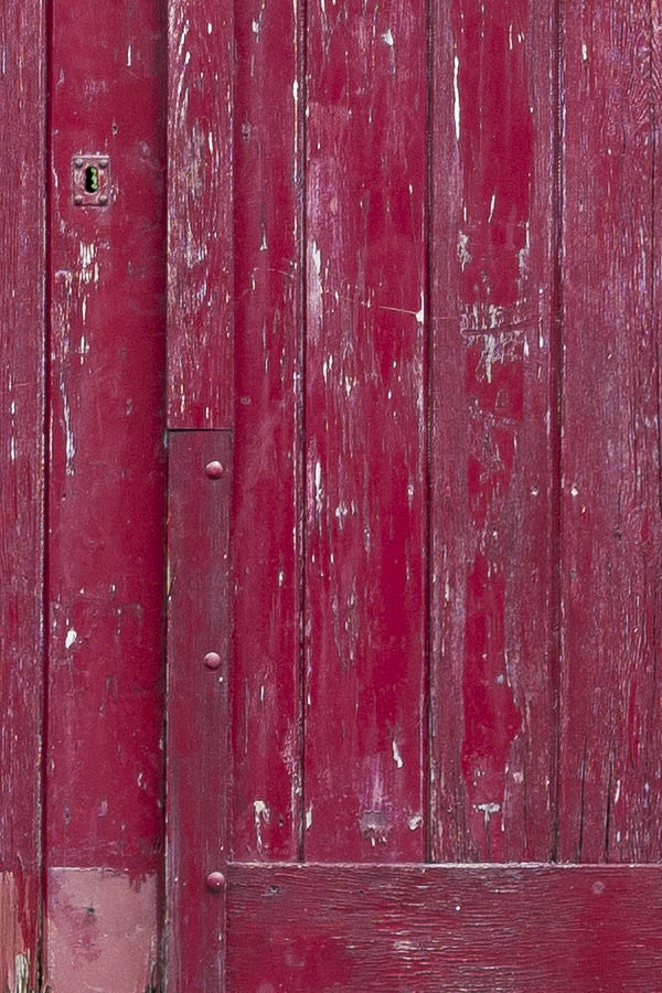 Photo 15848: Decayed, cerise red gate made of planks