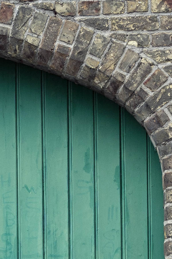 Photo 15856: Worn, formed, green gate made of planks