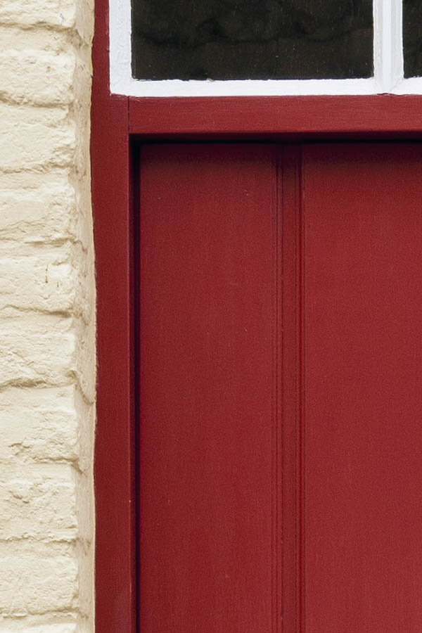 Photo 15942: Red door made of planks with red and white top window