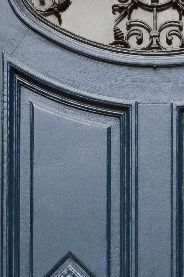 Photo 16101: Formed, panelled, carved, blue door with oval, latticed door light