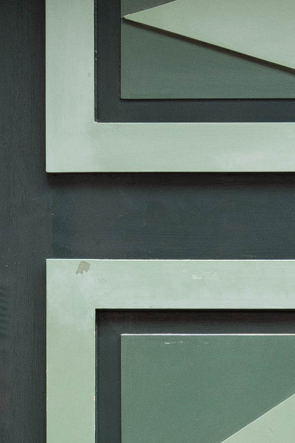 Photo 16263: Wide, panelled, carved, green, light green and grey door