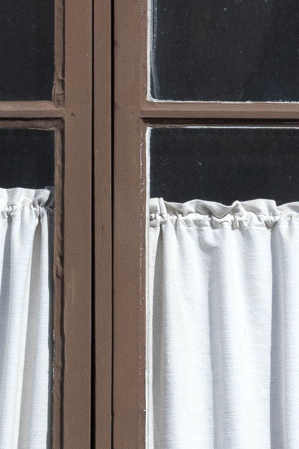 Photo 18250: Brown window with two frames and four panes in a white outer frame