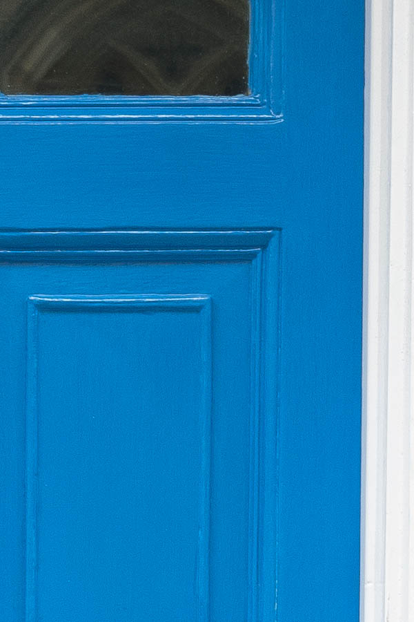 Photo 18817: Panelled, blue door with door lights in a white frame