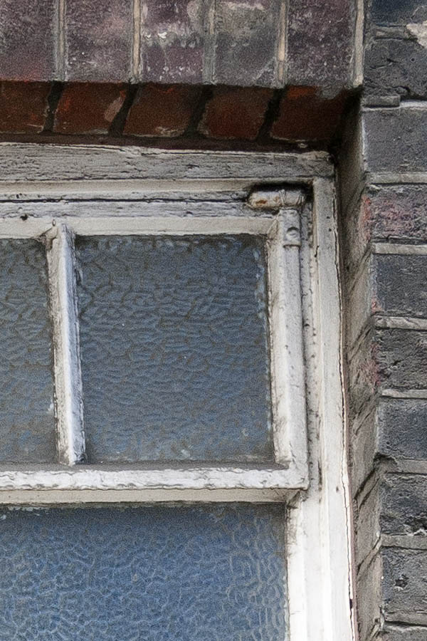 Photo 18888: Worn, white window with six frames and nine panes