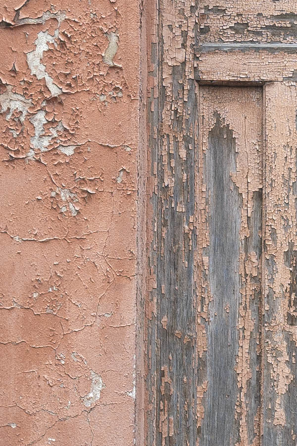 Photo 19785: Narrow, worn, panelled, carved, pink and unpainted double door with top window