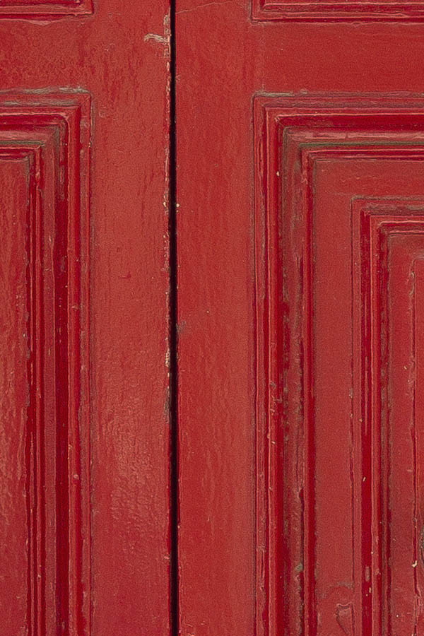 Photo 24111: Worn, panelled, red double door with latticed top window
