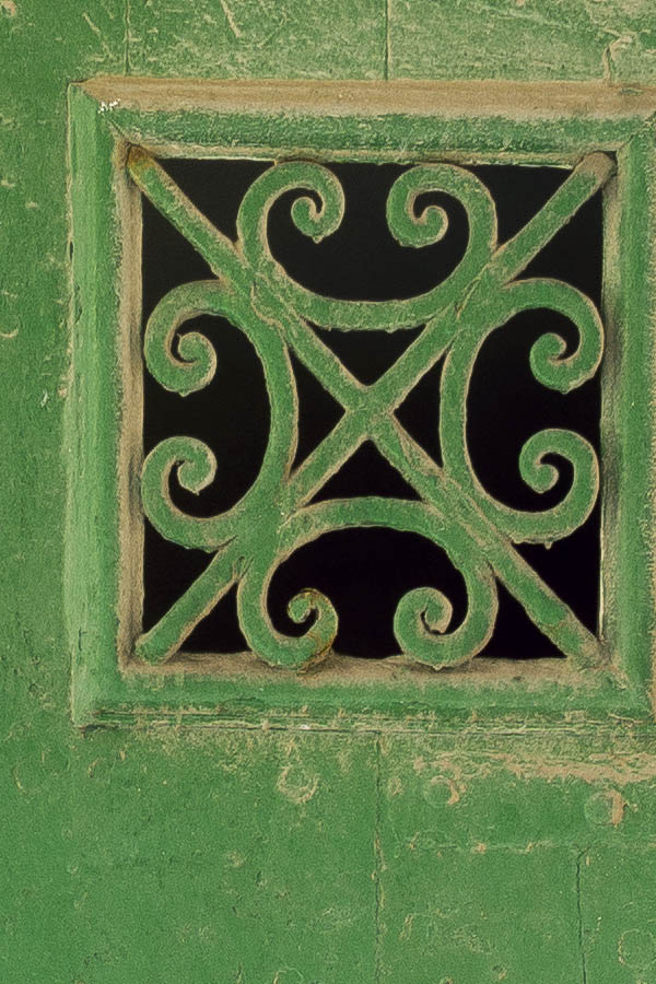 Photo 24112: Formed, green gate of planks with latticed door windows