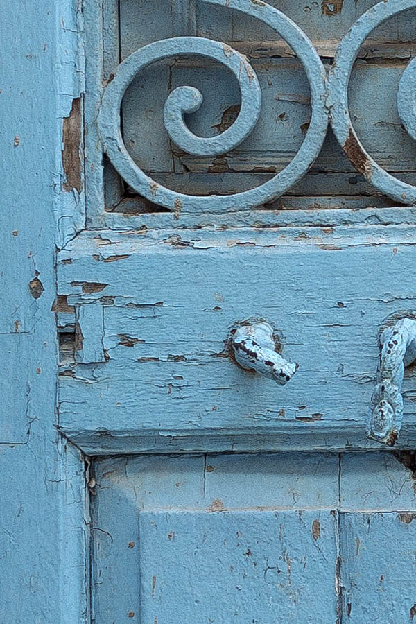 Photo 24587: Decayed, panelled, lopsided, light blue double door with latticed door lights