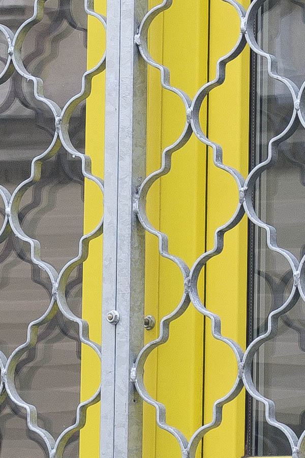 Photo 24911: Large, latticed, yellow plastic window with eight frames