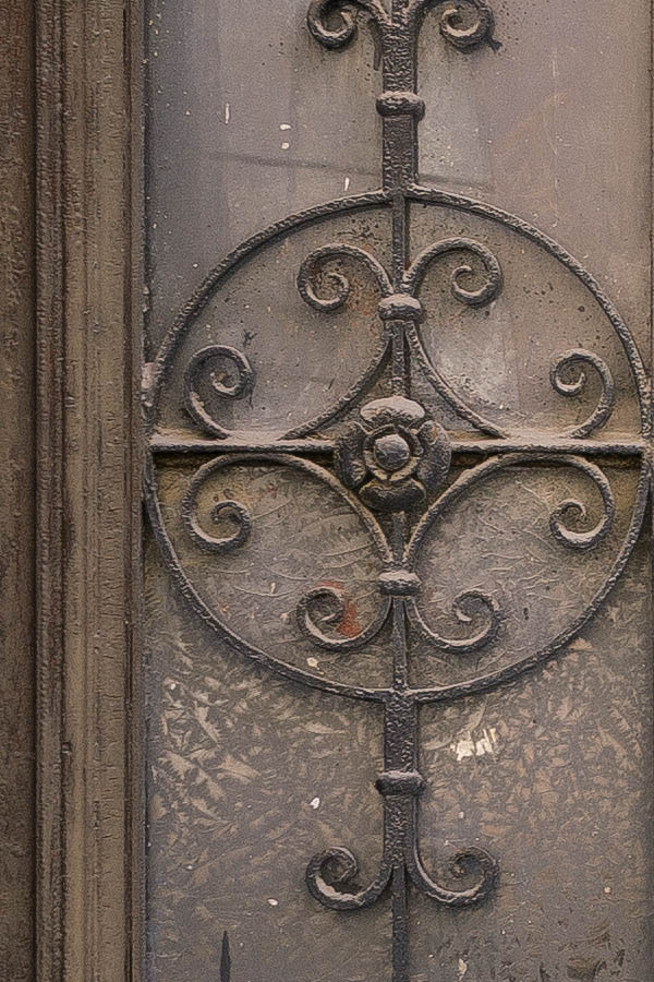 Photo 25358: Decayed, panelled, carved, brown and unpainted double door with latticed door lights and fan light