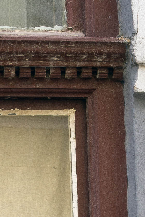 Photo 25398: Carved, brown window with four frames