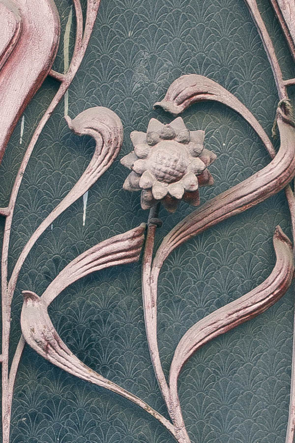 Photo 25554: Worn, panelled, formed, pink double door with latticed door lights and fan light