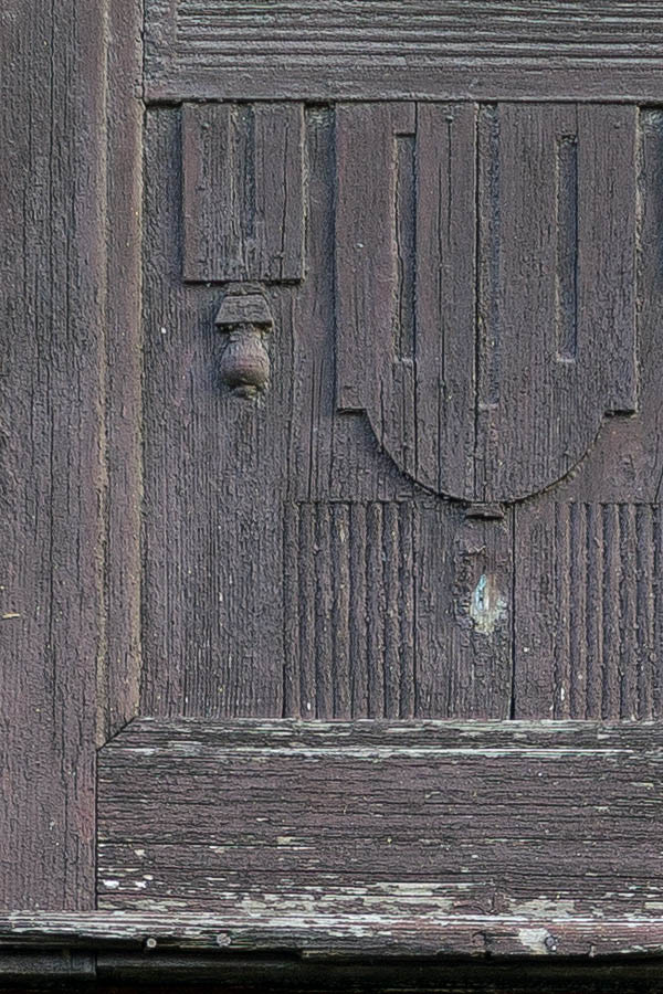 Photo 25838: Worn, panelled, carved, formed, brown gate with minor door and top windows
