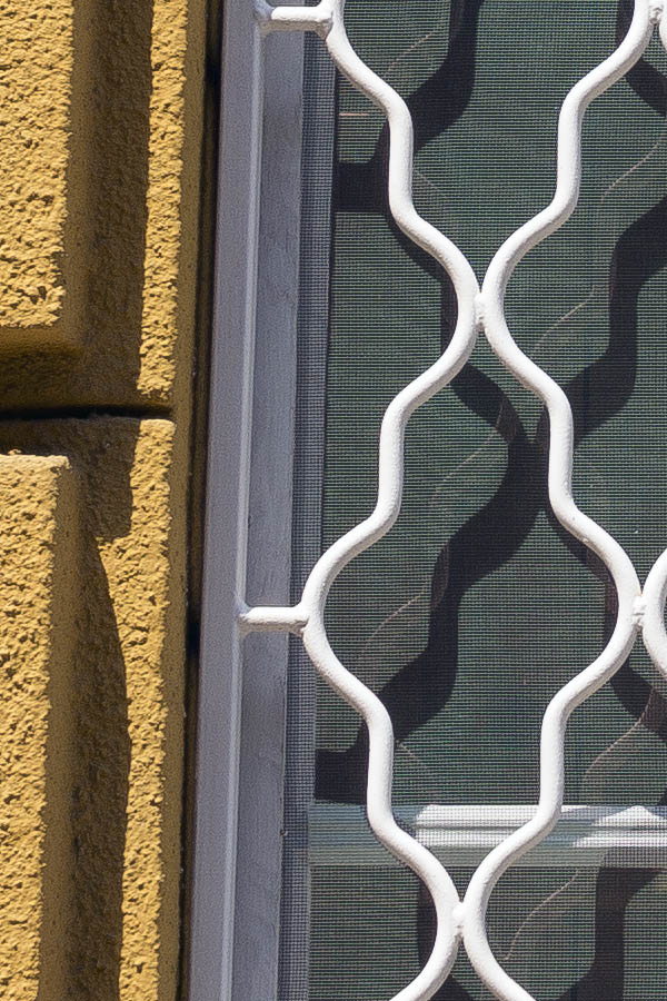 Photo 26006: White and green, latticed window with four frames and six panes