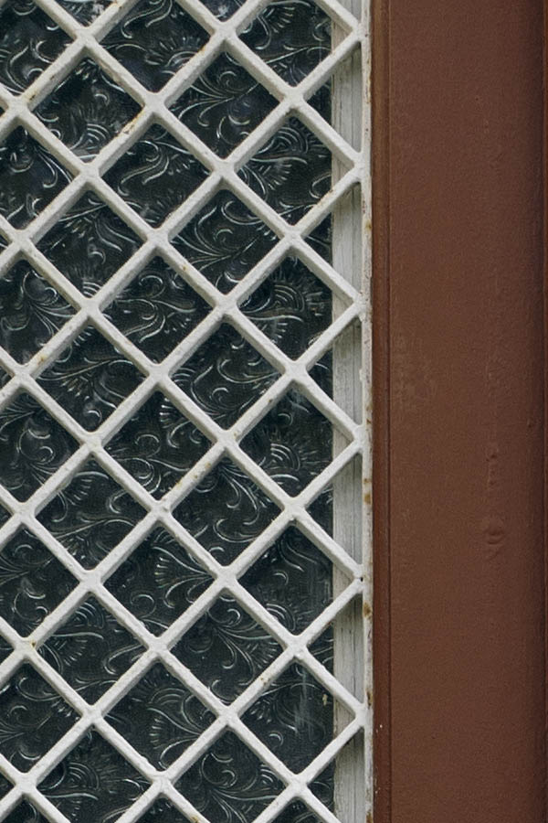 Photo 26807: Brown, panelled double door with white lattice