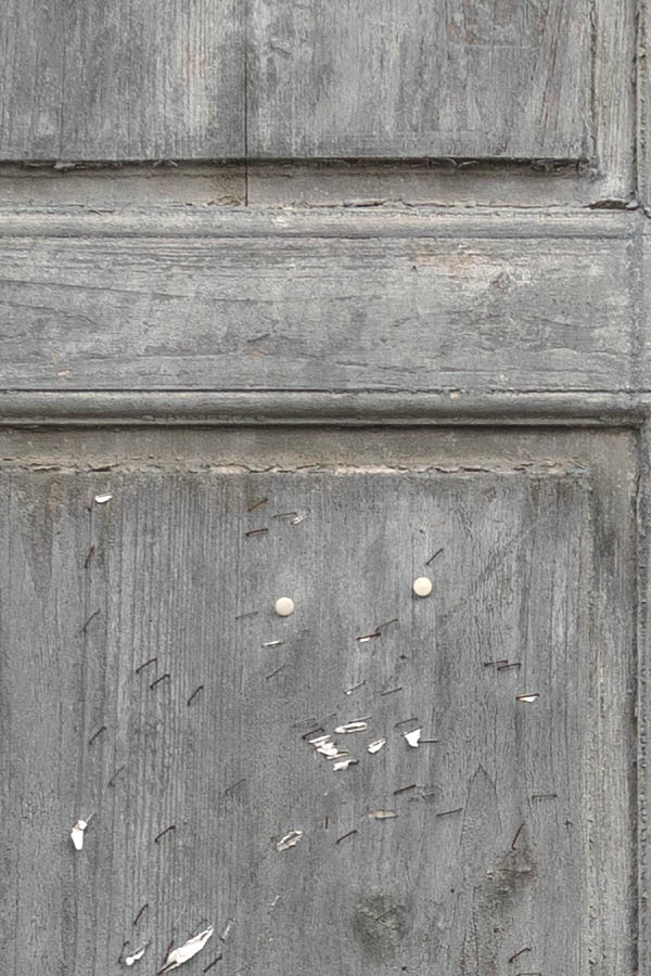 Photo 26890: Decayed, unpainted, panelled double door