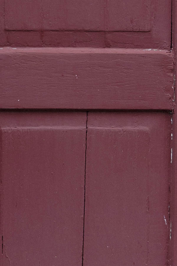 Photo 27056: Red, panelled double door in a white frame with top window