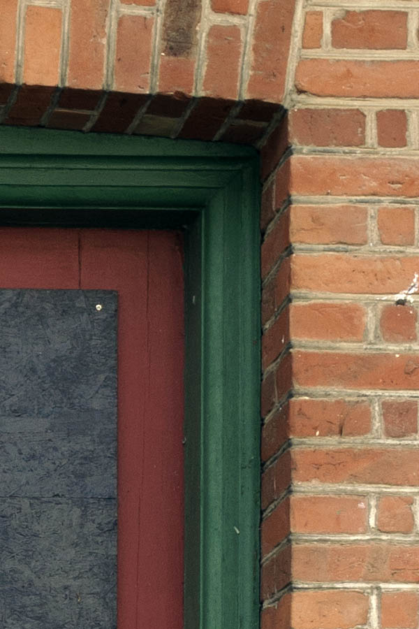 Photo 27391: Worn, red, panelled double doors
