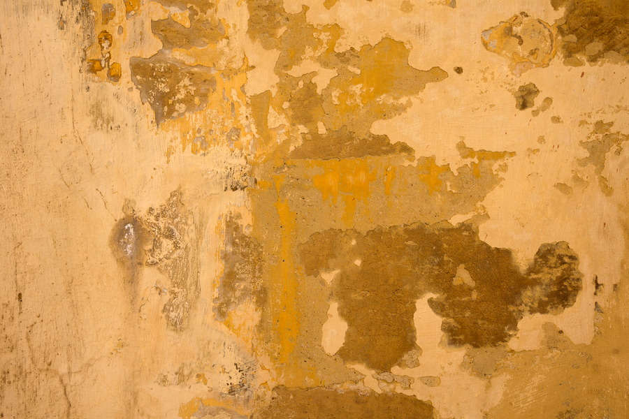 Photo 24098: Worn, orange, plastered wall