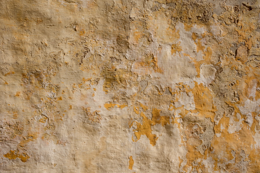 Photo 24257: Worn, plastered wall in yellow and light yellow colours