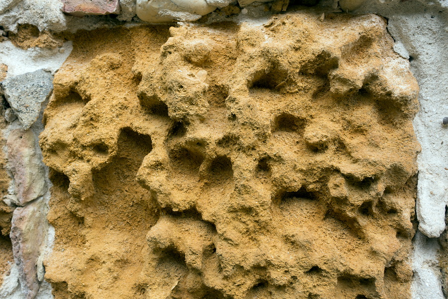 Photo 24483: Decayed, yellow sandstone in mortar