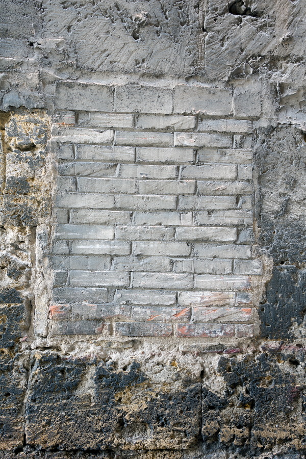 Photo 24612: Decayed wall with former window blocked by grey bricks