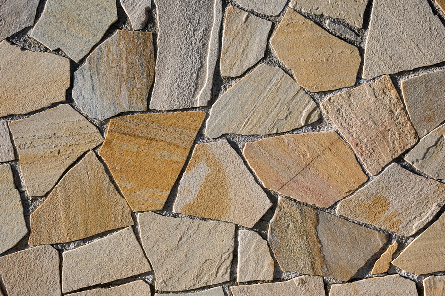 Photo 24723: Wall of irregular, light brown tiles