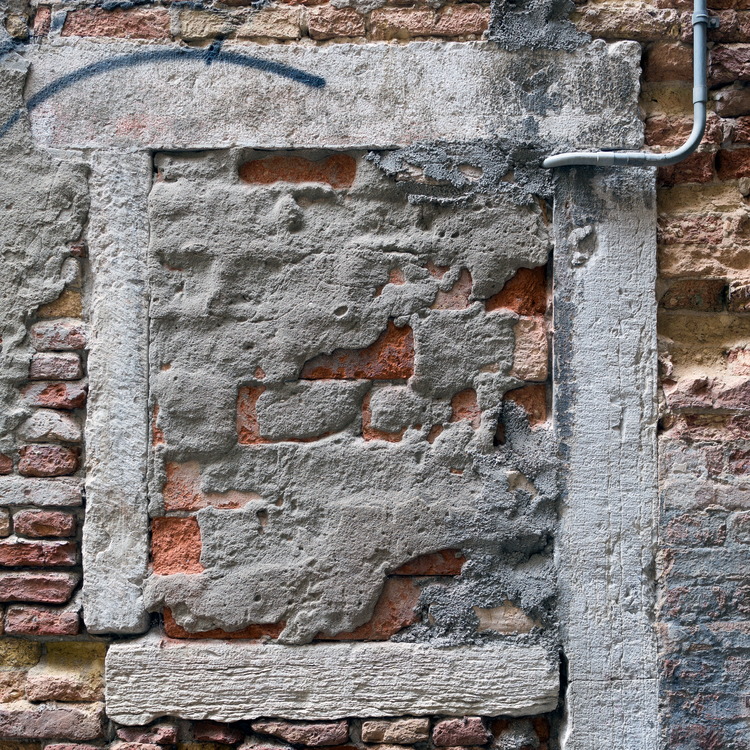 Photo 24766: Red brick wall with decayed, grey plaster