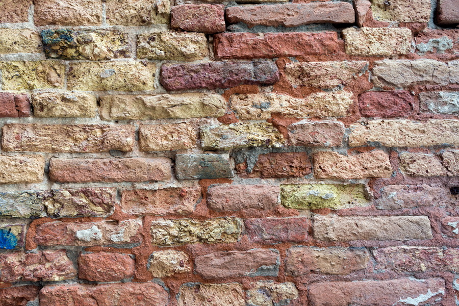 Photo 24822: Decayed brick wall in yellow, red and dark red colours