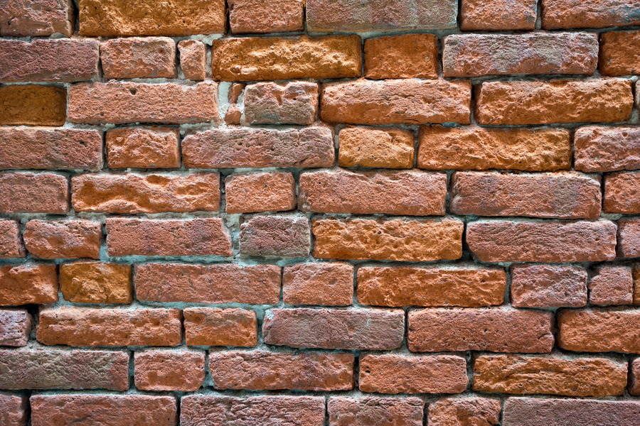 Photo 24850: Decayed, red and orange brick wall