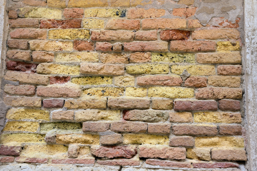 Photo 24859: Decayed brick wall in yellow and red colours