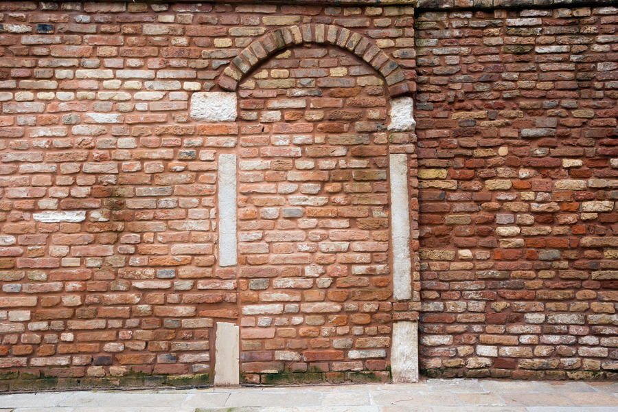 Photo 24864: Red brick wall with remains of a doorway