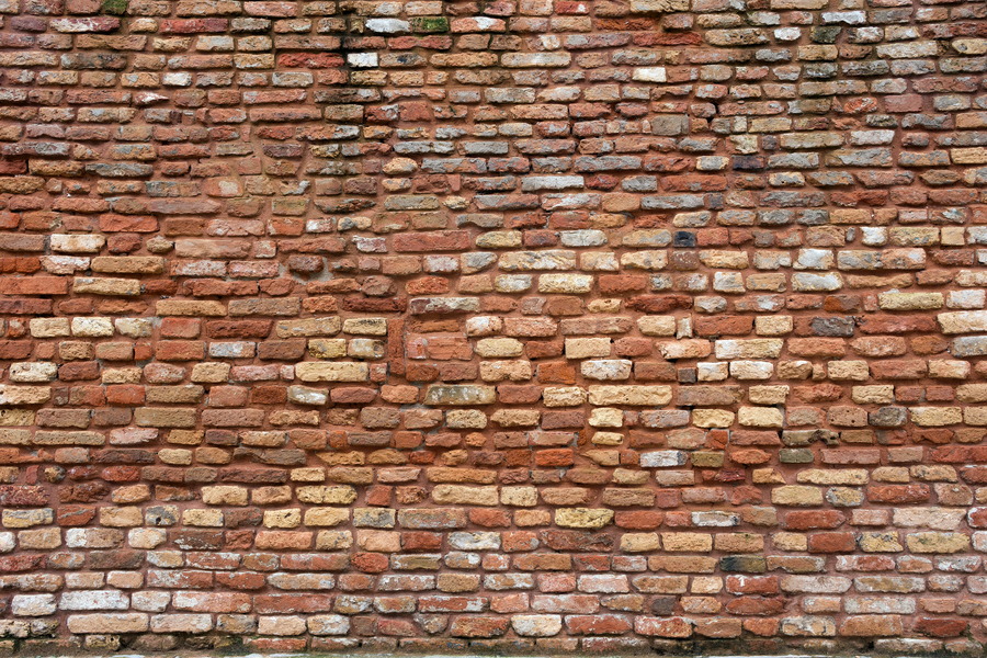 Photo 24865: Decayed brick wall in red, yellow, white and grey colours